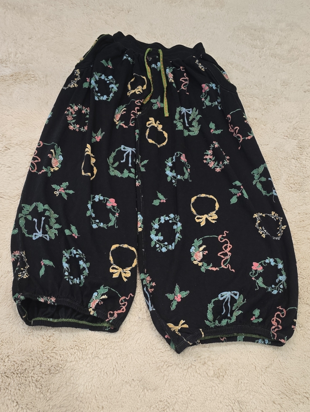 Black Floral Wreath Track Pants with Pastel Accents